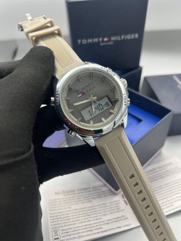 Hilfiger watch 
Analogue + digital screen